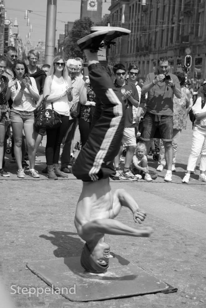 Street performer - spinning on his head