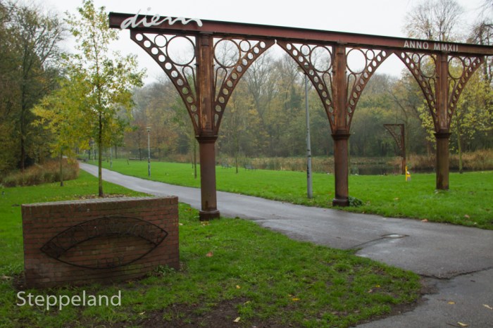 Arches of the Parisian markethalls at the entrance of the WH Vliegenbos